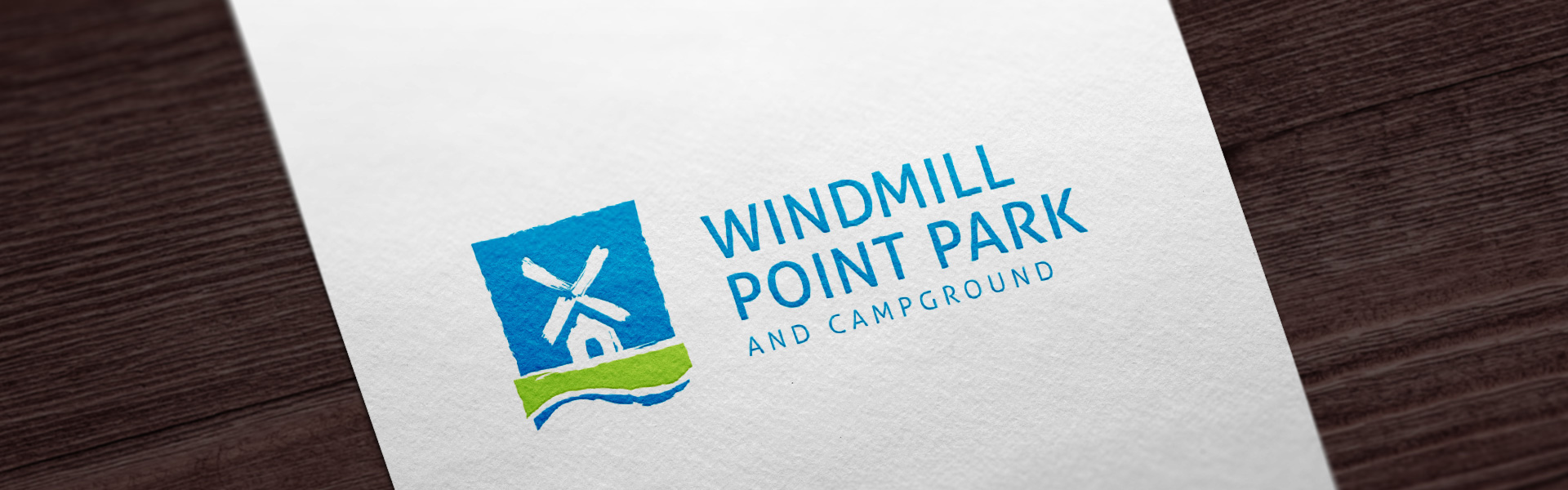 Windmill Point Park identity – stylized windmill with text